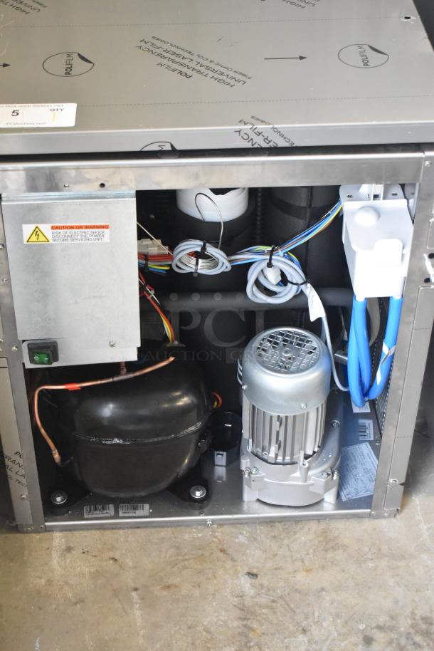 BRAND NEW 2025 Manitowoc RNP0620A-161 Nugget Ice Machine, 591 lb capacity, 115V. Interior wiring and motor visible.