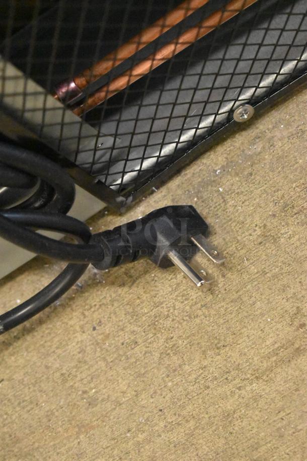 Brand new Avantco 178AU60R, 2-door undercounter cooler, 115V plug shown; slight scratches.