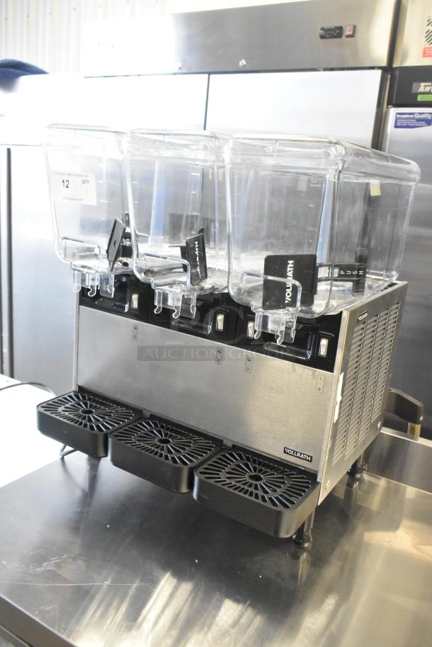 Brand new Vollrath VBBD3-37-F triple 3.17-gallon refrigerated beverage dispenser, stainless steel, scratch and dent model.