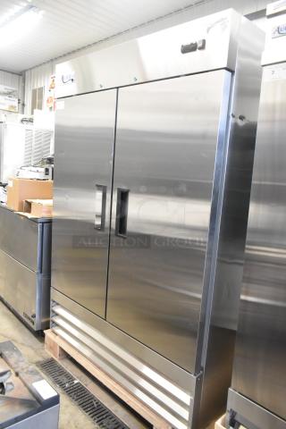 Brand new Avantco 178A49RHC 2023 commercial 2-door reach-in cooler, 115 volts, 1 phase, minor scratches and dents visible.