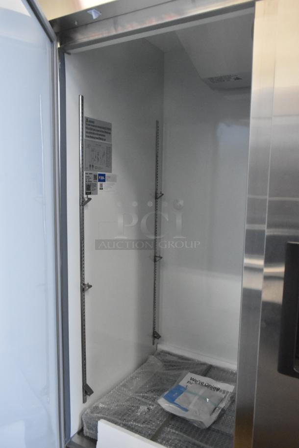 Brand new Avantco 178A49RHC 2 Door Commercial Cooler, 115V, 1 Phase, scratch and dent condition, shelving visible.