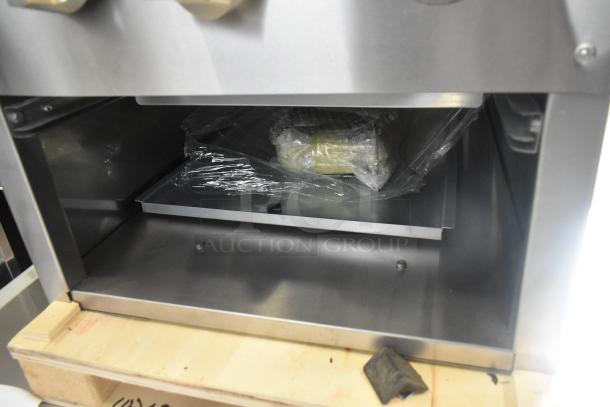 Brand new Cooking Performance Group stock pot range CPG-DSPR-L, 160,000 BTU, liquid propane, in packaging, scratch and dent condition.