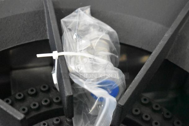 Cooking Performance Group CPG-DSPR-L stock pot range, 160,000 BTU, new, visible parts in plastic packaging.