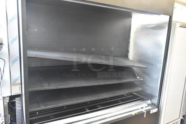 Brand new Avantco 193VOA60B black extra deep vertical open air merchandiser with LED lighting, 115V, 1 phase, minor scratches.