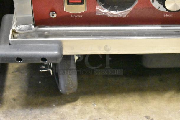 Brand new Avantco HPI-1836 heated holding cabinet, clear door, 115V, 1 phase; minor scratches, commercial casters visible.