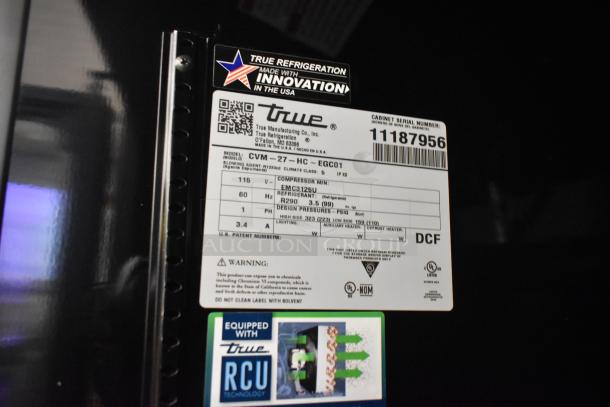 True CVM-27-HC Refrigerated Merchandiser, black, scratch and dent, 115V, LED lighting, label shows model and specs.