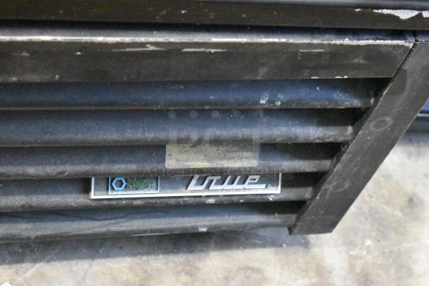 2019 True GDM-72-HC commercial cooler, 3-door, 115 volts, 1 phase, with visible True logo, used condition.