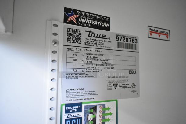 2019 True GDM-72-HC commercial cooler label shows 115V, 1 phase, R290 refrigerant. Serial number 9728763. Made in USA.