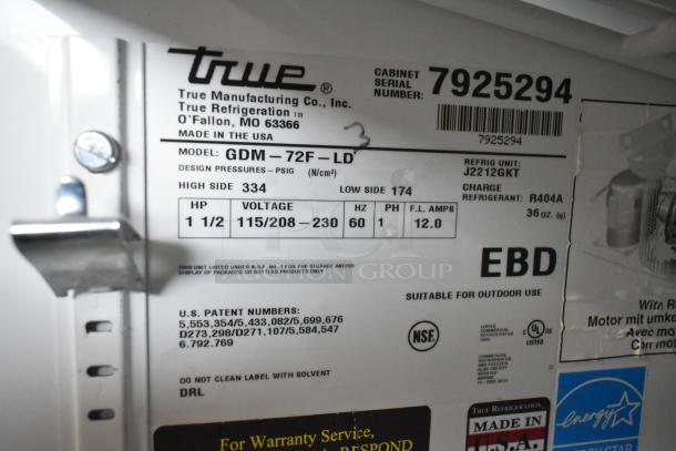 True GDM-72F-LD freezer label showing model, voltage 115/208-230, phase 1, refrigerant R404A, serial number 7925294.
