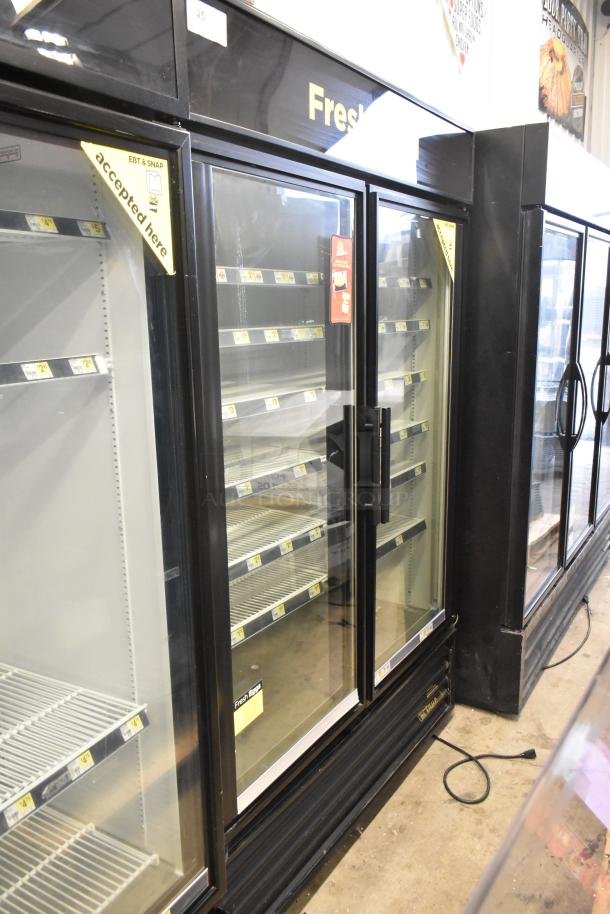 True GDM-49 commercial 2-door reach-in cooler merchandiser, glass doors, shelves, black exterior, 115 volts, 1 phase.