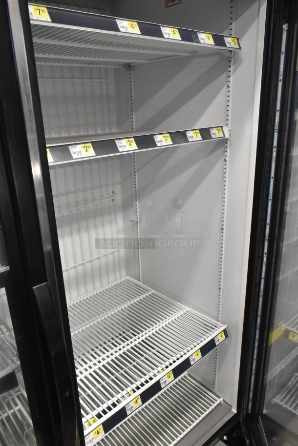 2017 True GDM-49F-HC commercial cooler, two glass doors, metal shelves, 115 volts, 1 phase, excellent condition.