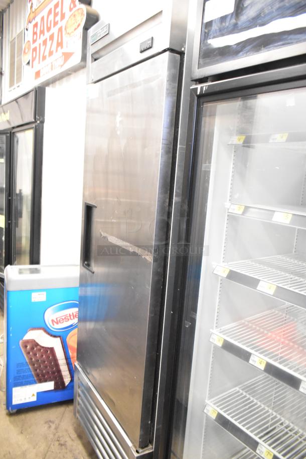 2019 True T-23F-HC commercial single-door reach-in freezer, stainless steel, visible scratches, on casters, 115V, 1 phase.