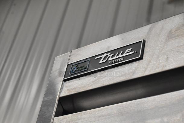 2019 True T-23F-HC freezer, stainless steel, single door, commercial casters, "True Freezer" logo, natural refrigerant label.