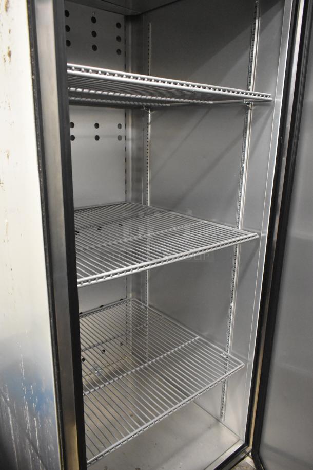 2019 True T-23F-HC commercial freezer, single door, interior shelving, on casters, 115 volts, used condition.
