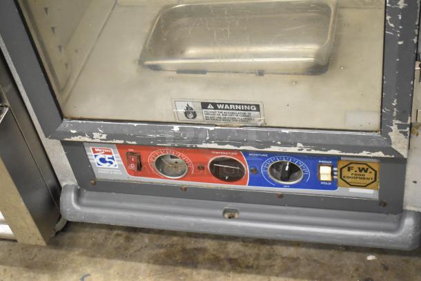 2016 Metro C519-CFC-U heated holding cabinet with visible controls, warning label, and commercial casters. Used condition.