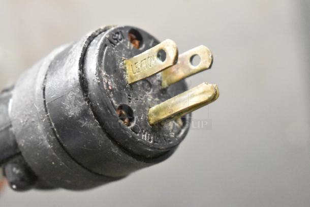 Close-up of a plug compatible with the 2016 Metro C519-CFC-U Heated Holding Cabinet, showing electrical connections and "Leviton" marking.