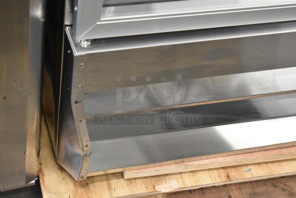 Brand new KoolMore RIR-2D-GD commercial reach-in cooler with minor dents, stainless steel finish, 115V, 1-phase.