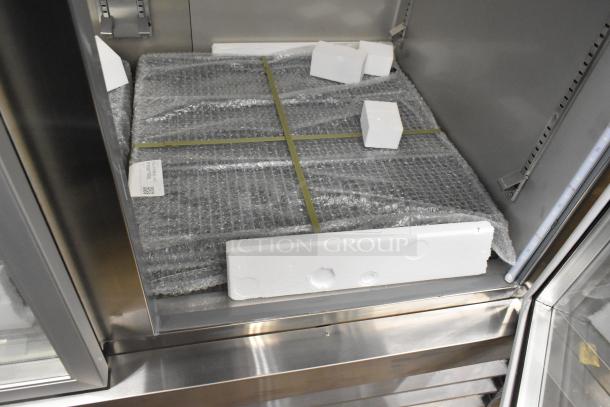 Brand new KoolMore RIR-2D-GD commercial cooler, 2-door, 115V, with packaging; scratch and dent condition.