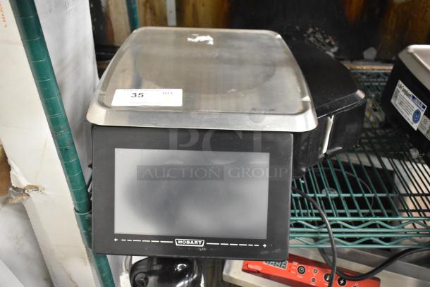 2017 Hobart HTi-7LH26 metal commercial scale. Tested, does not power on. Model label visible on front panel.