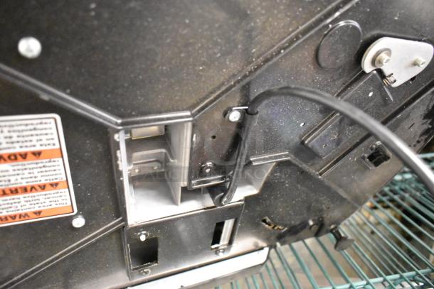 2017 Hobart HTi-7LH26 metal commercial countertop food portioning scale, does not power on, cables and warnings visible.