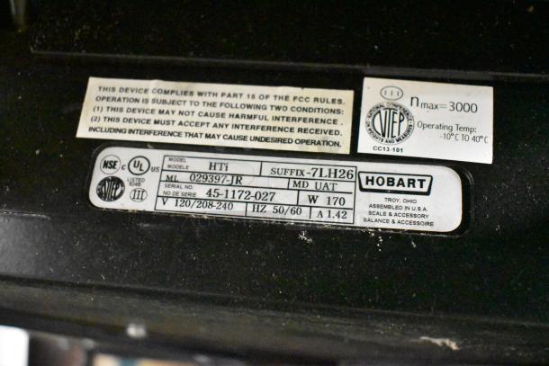 2017 Hobart HTi-7LH26 commercial scale label, 120/208-240V, single-phase, tested with power issue. FCC compliance noted.