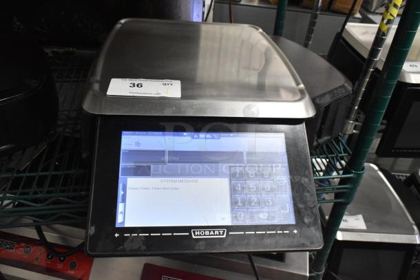 2017 Hobart HTi-7LH26 metal commercial countertop scale, touchscreen, tested, without power cord, 120/208-240V, 1 phase.