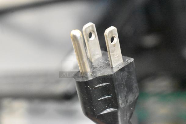 Close-up of a power plug for a 2017 Hobart HTi-7LH26 commercial scale, 120/208-240 volts, 1 phase.