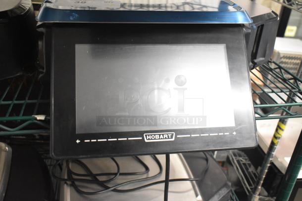 2017 Hobart HTi-7LH26 metal commercial scale, tested and working. Features a digital display, suitable for food portioning.