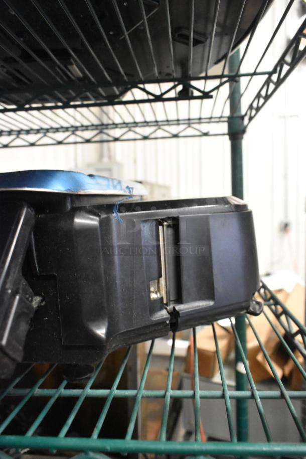 2017 Hobart HTi-7LH26 commercial scale on a metal shelf. Black casing, tested and working condition.