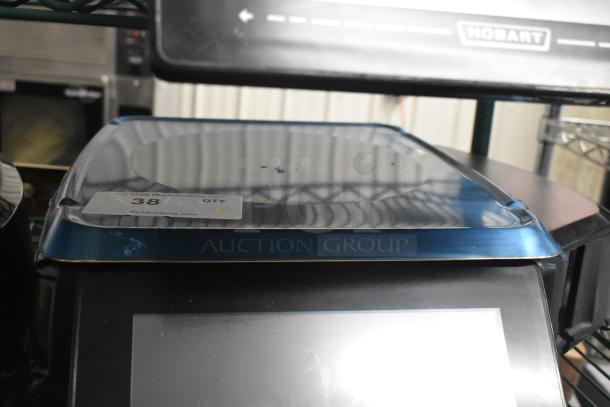 2017 Hobart HTi-7LH26 metal commercial food portioning scale, tested working, with label showing auction details.