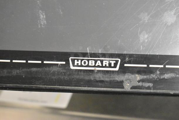 2016 Hobart HTi-7LH metal commercial scale, missing right legs, no power cord, working condition, Hobart logo visible.