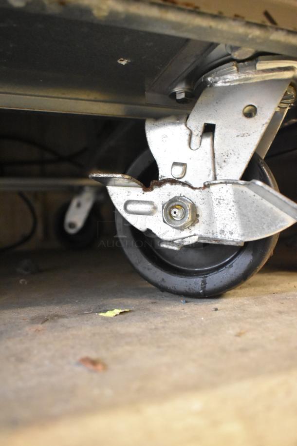 Beverage Air HBF49-1 freezer caster, showcasing robust wheels for easy mobility.