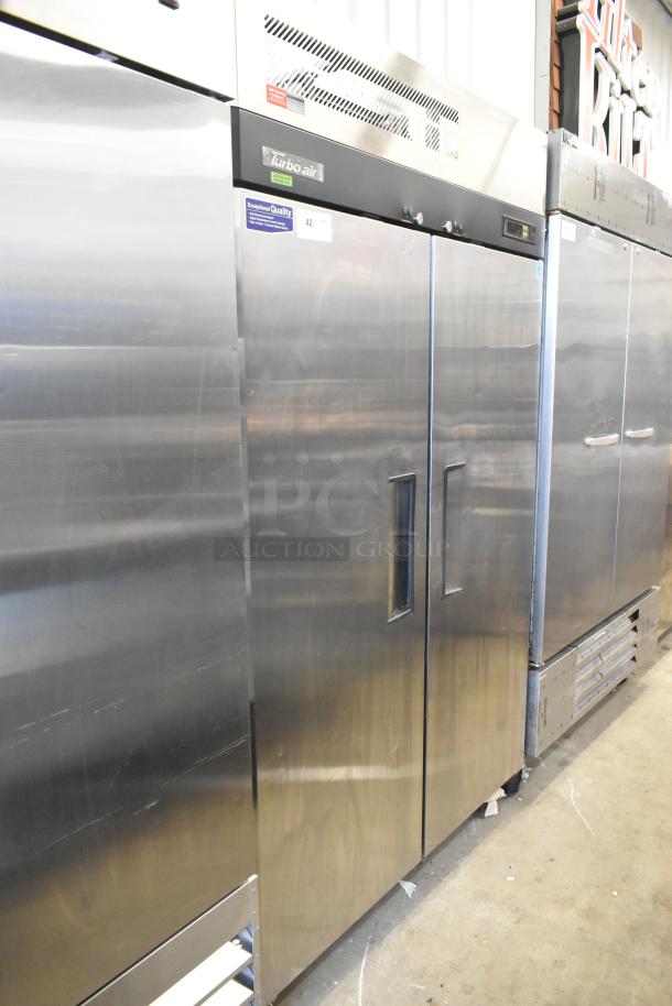 Turbo Air M3F47-2-N 2 Door Reach-In Freezer, stainless steel, commercial casters, 115V, 1 phase, excellent condition.