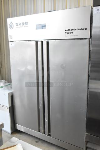 2021 COW800 Commercial 2 Door Reach In Cooler, stainless steel, with casters. Label: 115 Volts, 1 Phase. Model COW800.