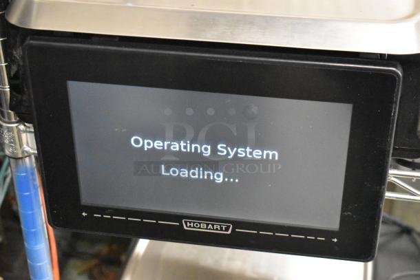 2024 Hobart HTi-7LH4W Metal Commercial Scale display with "Operating System Loading," tested and working condition.