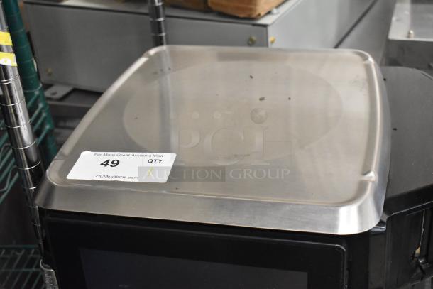 2024 Hobart HTi-7LH4W metal commercial countertop food portioning scale. Tested, working, 120/208-240 volts, 1 phase. Item tag "49".