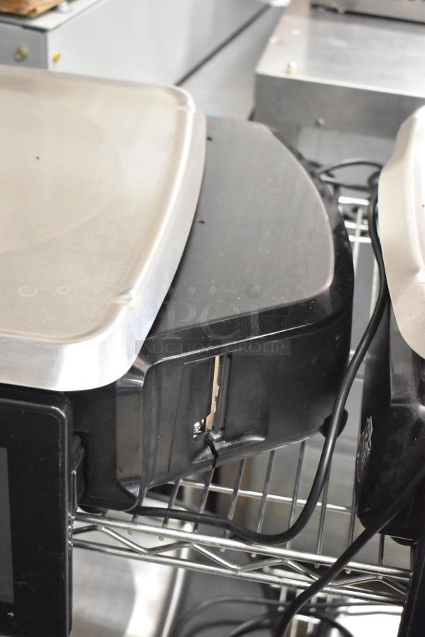 2024 Hobart HTi-7LH4W metal countertop food portioning scale, good condition, 120/208-240V, 1 phase, tested and working.