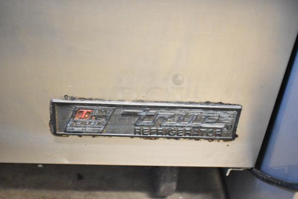 True TSSU-48-12 Sandwich Prep Table, commercial casters, 115V, 1 phase, True Refrigeration logo plate visible.