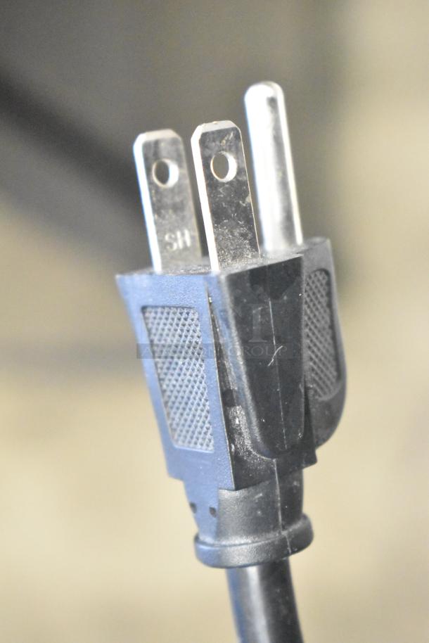 Close-up of a power plug for the Wonder AMZ-B-20 Hot Water Heater, showing a standard 120V, 1-phase connection.