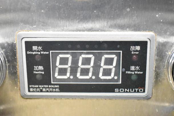 Sonuto SZ-200 countertop hot water dispenser, digital display showing 8.8.8, indicators for heating, error, and water filling.