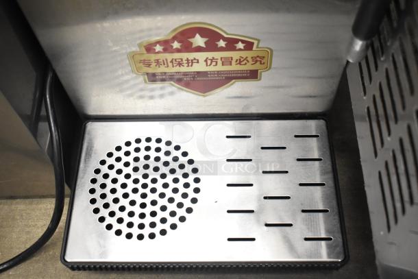 Sonuto SZ-200 Commercial Hot Water Dispenser, 220V, 1 Phase, countertop model with drip tray and safety label.