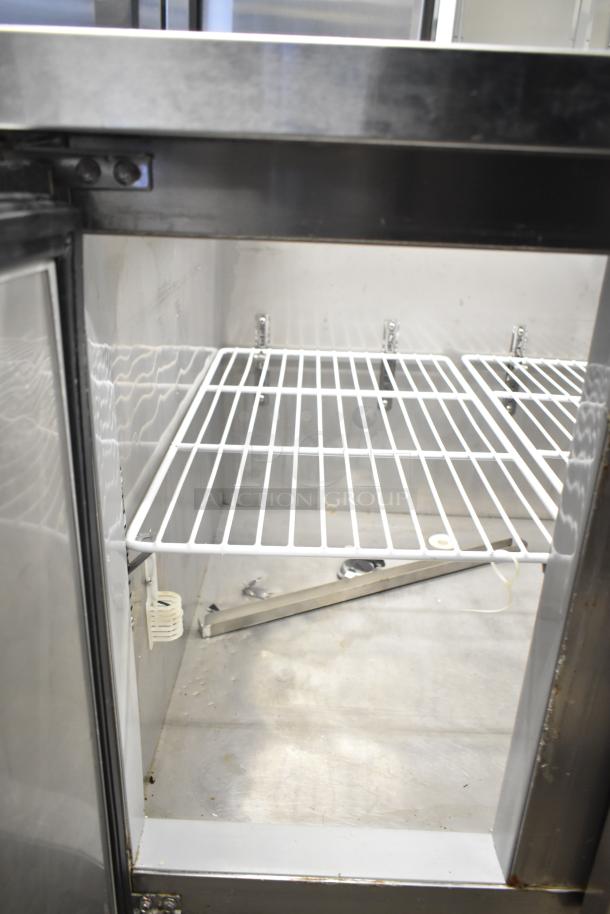 Lasbem HZ0.2L2-CPL sandwich salad prep table, open top, bain marie. Good condition, 220V, 1 phase. Features wire shelf.
