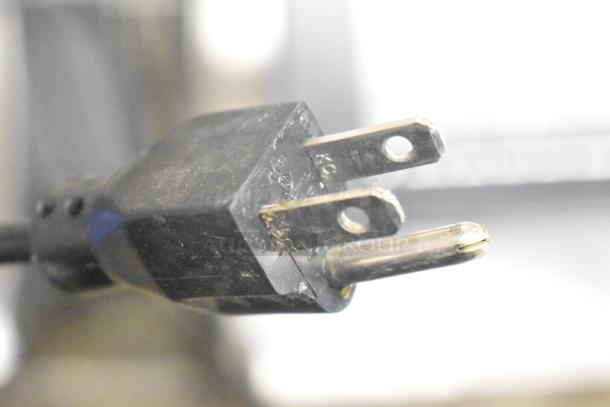 Close-up of a black electrical plug compatible with the 2021 Hobart HTi-7LH4W scale, tested and working.