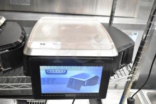 2016 Hobart HTi-LH metal commercial food portioning scale, countertop model. Tested, working. Capacity 120/208-240V, 1 Phase. Visible model label.