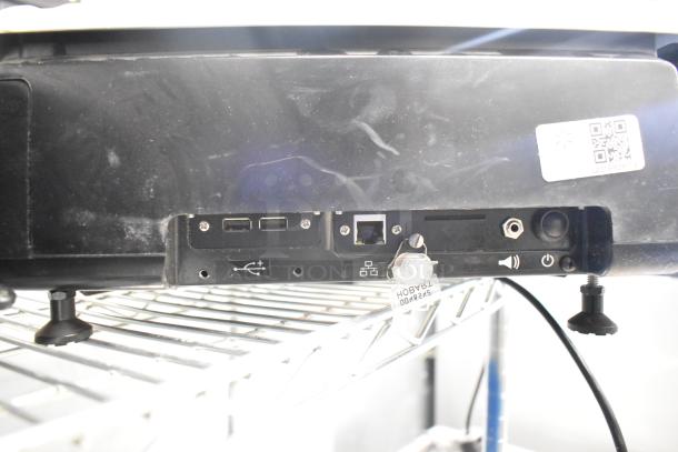 2016 Hobart HTi-LH metal food portioning scale, 120/208-240V, 1 Phase. Tested, working, visible ports and QR code label.