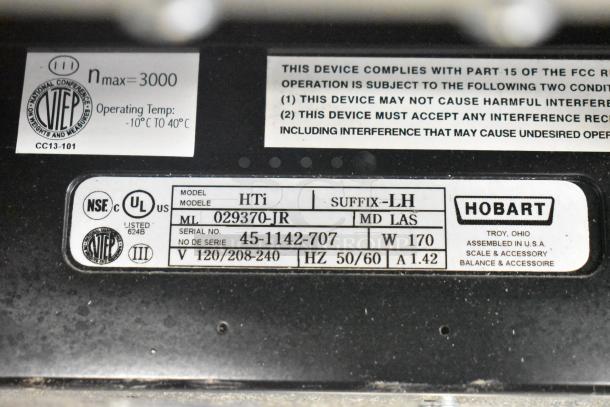 2016 Hobart HTi-LH commercial scale label details voltage, phase, and model info. Tested and working condition.