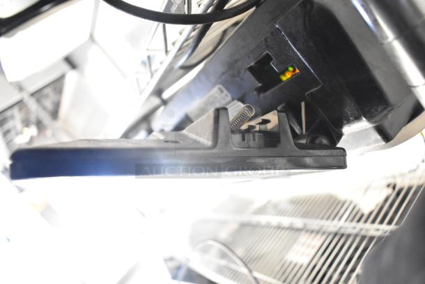 2017 Hobart HTi-7LH26 commercial countertop food portioning scale. Black casing, tested working, uses 120/208-240V, 1 phase.