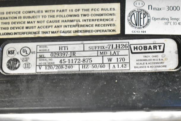 2017 Hobart HTi-7LH26 metal food portioning scale with labels, tested and working, 120/208-240V, 1 Phase.