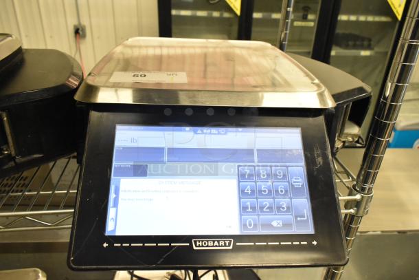 2017 Hobart HTi-7LH26 metal food portioning scale with touchscreen, tested working, no power cord, suitable for commercial use.