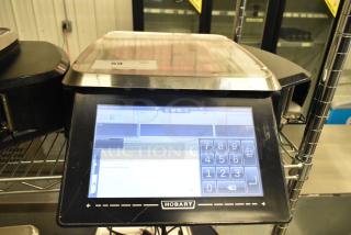 2017 Hobart HTi-7LH26 metal food portioning scale with touchscreen, tested working, no power cord, suitable for commercial use.